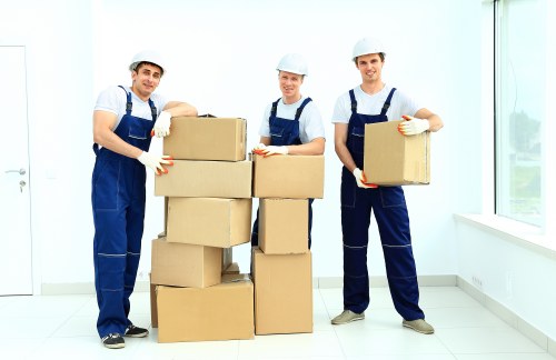 Packed moving boxes ready for flat removals in Balham