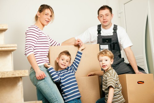 Movers carrying furniture for a small removal in Balham
