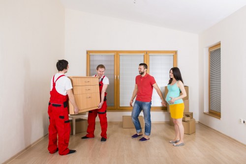 Furniture and boxes being loaded for small removals service