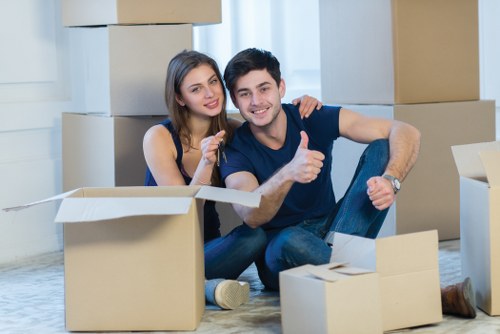 Organised storage unit with labeled boxes and household items